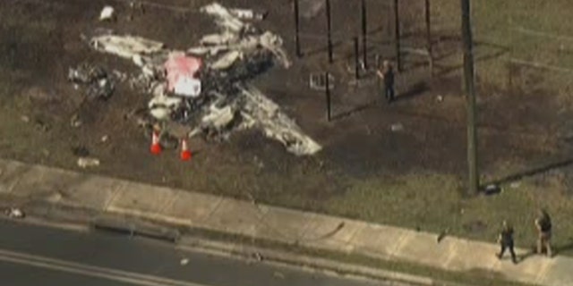 Two people have died after a small plane crashed into an SUV while trying to make an emergency landing on Thursday in Florida, authorities said.