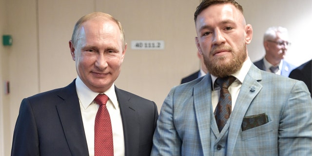 Russian President Vladimir Putin and Irish MMA fighter Conor McGregor at the final match of the 2018 FIFA World Cup in Russia.