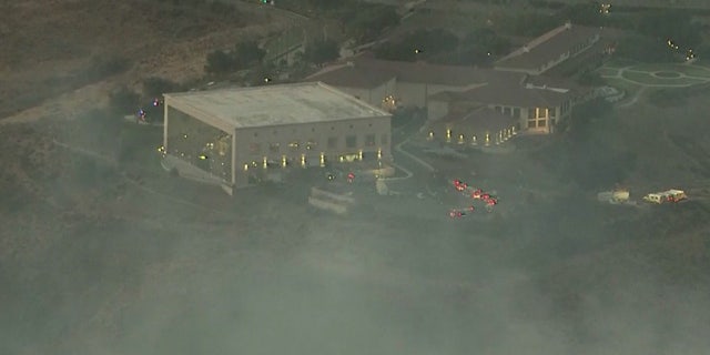 Smoke from the Easy Fire can be seen shrowding the Ronald Reagan Presidential Library and Museum in Simi Valley, Calif.