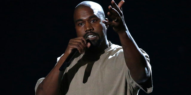Kanye West accepts the Video Vanguard Award at the 2015 MTV Video Music Awards. REUTERS/Mario Anzuoni