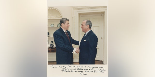 President Ronald Reagan and his friend from his Hollywood years, Douglas Morrow, in the Oval Office.