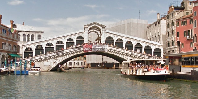 A tourist was arrested in Venice after allegedly holding a currency exchange worker in a hostage.