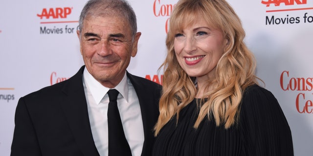Robert Forster, left, and Denise Grayson attend the 18th Annual Movies For Grownups Awards at Beverly Wilshire Hotel, in Beverly Hills, Calif. Forster, the handsome character actor who got a career resurgence and Oscar-nomination for playing bail bondsman Max Cherry in "Jackie Brown," has died at age 78. Forster's agent Julia Buchwald says he died Friday, Oct. 11, 2019, at home in Los Angeles of brain cancer. (Photo by Phil McCarten/Invision/AP, File)
