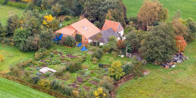 An aerial picture taken on October 15, 2019 shows a view of the farm where a father and six children had been living in the cellar, In Ruinerwold, northern Netherlands.