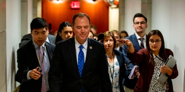 House Intelligence Committee Chairman Rep. Adam Schiff of Calif., leaves a secure area where Deputy Assistant Secretary of Defense Laura Cooper is testifying as part of the House impeachment inquiry into President Donald Trump, Wednesday, Oct. 23, 2019, on Capitol Hill in Washington. (AP Photo/Patrick Semansky)