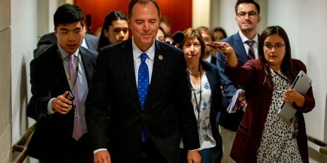 House Intelligence Committee Chairman Rep. Adam Schiff of Calif., leaves a secure area where Deputy Assistant Secretary of Defense Laura Cooper is testifying as part of the House impeachment inquiry into President Donald Trump, Wednesday, Oct. 23, 2019, on Capitol Hill in Washington. (AP Photo/Patrick Semansky)