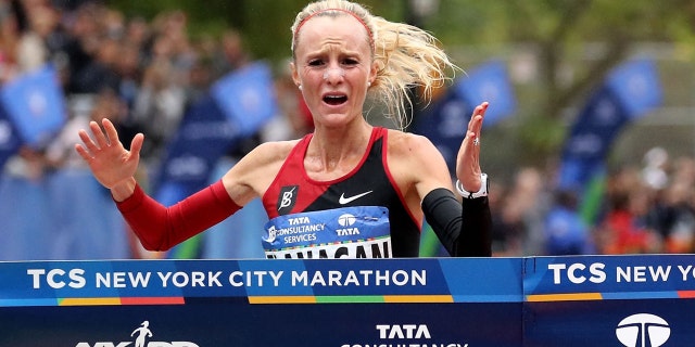 Nov. 5, 2017: Shalane Flanagan celebrates winning the Professional Women's Division during the 2017 TCS New York City Marathon.