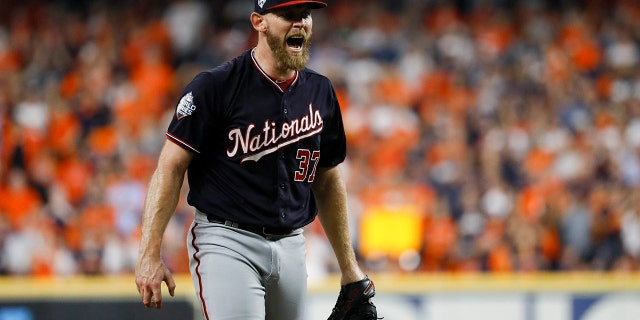 Washington Nationals starting pitcher Stephen Strasburg reacts after the out out in the sixth inning of Game 2 of the baseball World Series against the Houston Astros Wednesday, Oct. 23, 2019, in Houston. (AP Photo/Matt Slocum)