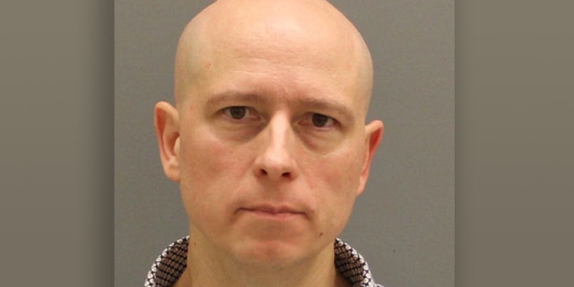 Mugshot for Timothy Koets, 50.