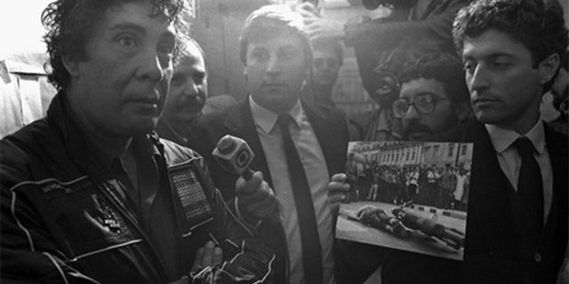 Tommaso Buscetta facing the press after his arrest in Brazil in 1983.