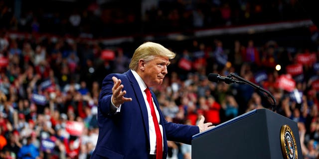President Donald Trump arrives to speak at a campaign rally at the Target Center, Thursday, Oct. 10, 2019, in Minneapolis. (AP Photo/Evan Vucci)