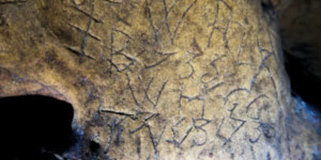 The cave is thought to be the largest collection of "witches' marks" in the U.K.  (Creswell Crags Museum and Heritage Centre)