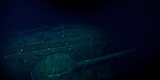 An undersea drone from research vessel RV Petrel captured eerie images of the aircraft carrier on the seabed.