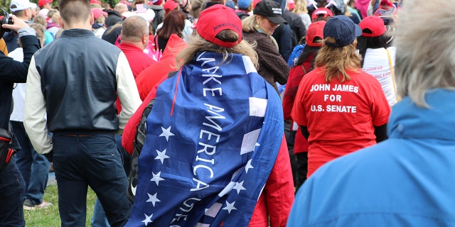 A woman draped in a