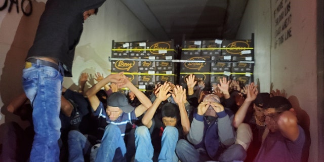 Officials discovered 32 illegal immigrants locked in a refrigerated semitrailer at a southern Arizona immigration checkpoint on Monday.