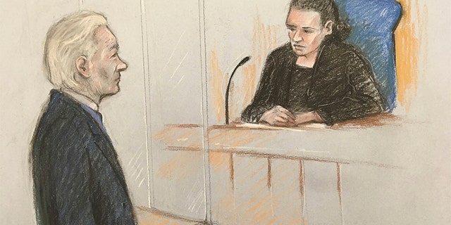 A court artist sketch showing Julian Assange facing District Judge Vanessa Baraitser at Westminster Magistrates' Court in London, on Monday.