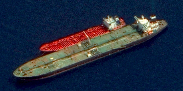 This satellite image made available Thursday, Oct. 3, 2019, by Maxar Technologies, shows the two Iranian-flagged tankers, the Adrian Darya 1 and the Jasmine, while the mooring lines tethering the two tankers together and a deployed crane on the starboard side of the Adrian Darya 1 off the coast of Syria. (Maxar Technologies via AP)