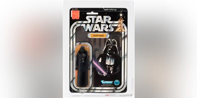 The Darth Vader figurine, expected to reach up to $100,000 at auction. (Credit: SWNS)