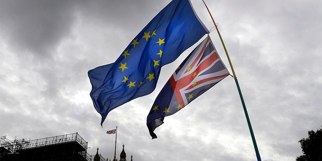 A European Union flag flies near Parliament in London on Tuesday. (AP)
