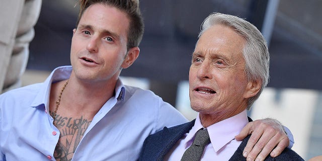 Cameron Douglas and Michael Douglas attend the ceremony honoring Michael Douglas with star on the Hollywood Walk of Fame on Nov. 06, 2018 in Hollywood. Cameron reflected on his Hollywood upbringing in a memoir being released in October 2019.