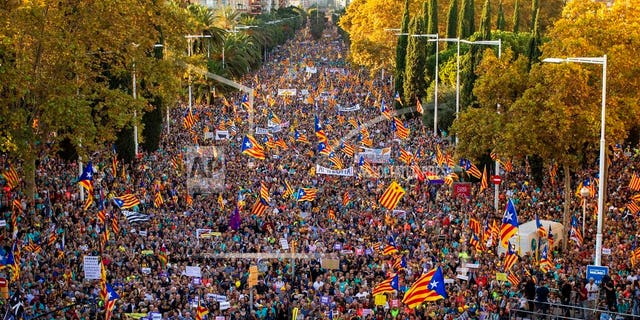 Catalan pro-independence protesters march during a demonstration in Barcelona, Spain, Saturday, Oct. 26, 2019.(AP Photo/Emilio Morenatti)