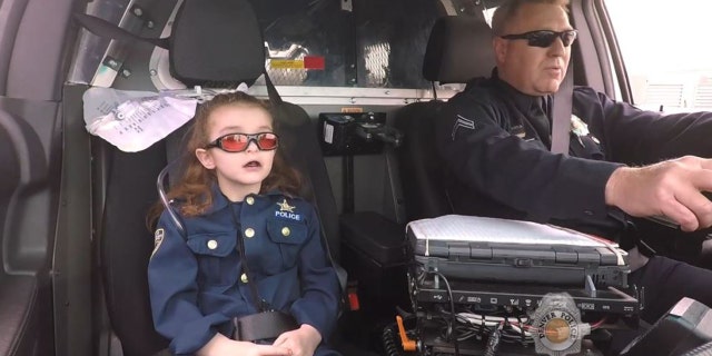 Media coverage showed 7-year-old Olivia Gant fulfilling a bucket list that included being a cop for a day