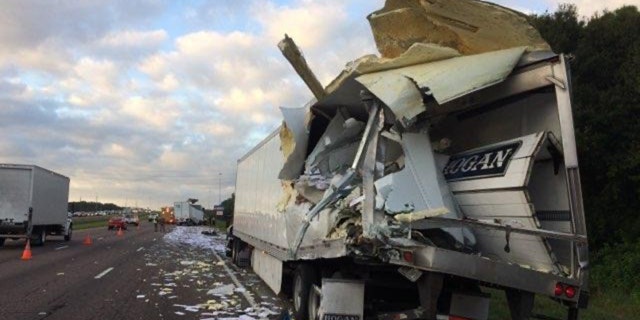 A tractor-trailer carrying mail on Monday crashed into another tractor-trailer on Interstate 75 in Florida, officials said.
