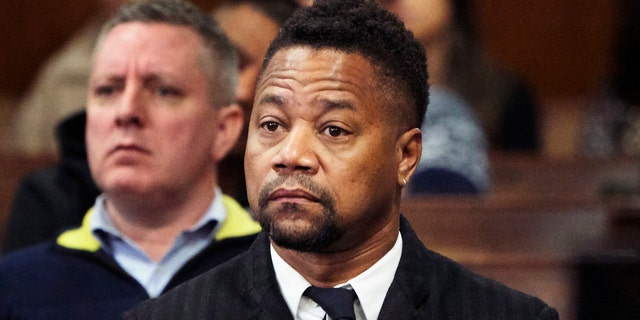Cuba Gooding Jr. appears in a courtroom in New York last week. The actor is accused of placing his hand on a 29-year-old woman's breast and squeezing it without her consent in New York on June 9.