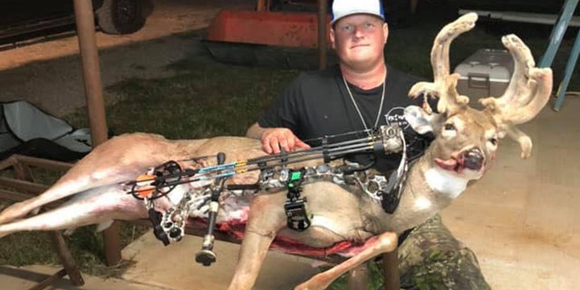 An image of hunter Chris Blades' with his recent October catch, an antlered whitetail doe.