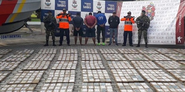 Authorities said the men had 1.2 tons of cocaine.