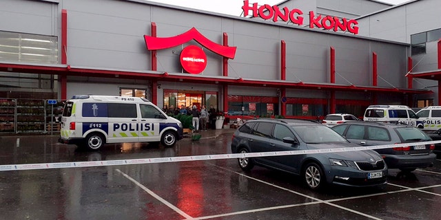 Police attend the scene of a violent incident at the Hermanni shopping center in Kuopio, Finland, Tuesday Oct. 1, 2019. (Jaakko Vesterinen/Lehtikuva via AP)