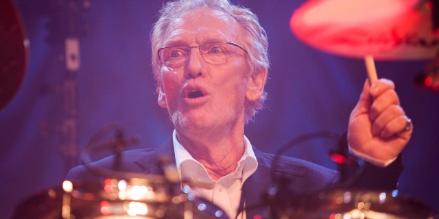 FILE - In this Sunday, Dec. 7, 2008 file photo, British musician Ginger Baker performs at the 'Zildjian Drummers Achievement Awards' at the Shepherd's Bush Empire in London.