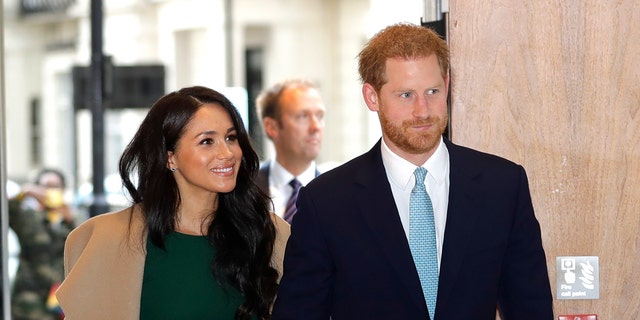 Britain's Prince Harry and Meghan, the Duke and Duchess of Sussex arrive to attend the WellChild Awards Ceremony in London.