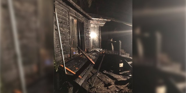 An image of Brian Rand and Curly's house, after the devastating blaze.