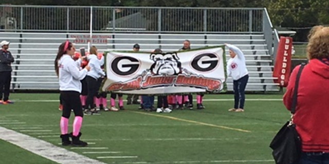 On October 5, Bryson, of Volo, Ill., which is about an hour from Chicago, wore a custom-made jersey and joined the young football team as their honorary captain, where he got to go through the banner with the team as they entered the field.