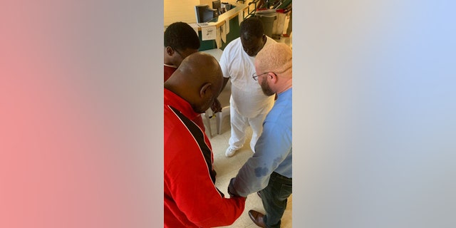 18 inmates were baptized Sunday at the W. Glenn Campbell Detention Center.