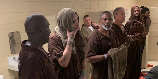 18 inmates were baptized Sunday at the W. Glenn Campbell Detention Center.