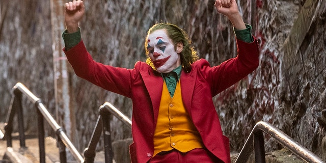 This image released by Warner Bros. Pictures shows Joaquin Phoenix in a scene from "Joker." 