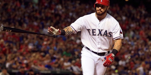 Josh Hamilton, a five-time MLB All Star and 2010 American League MVP, was charged Wednesday with injury to a child after his 14-year-old daughter told his ex-wife he had struck her at his Keller, Texas home. (USA Today Sports)