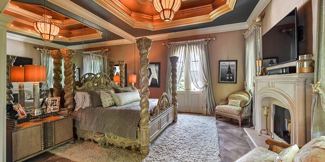 The master suite has its own fireplace, along with a sitting room.