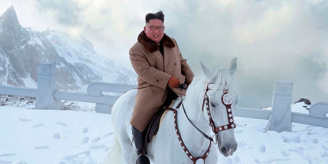 "He, sitting on the horseback atop Mt Paektu, recollected with deep emotion the road of arduous struggle he covered for the great cause of building the most powerful country with faith and will as firm as Mt Paektu," KCNA reported Wednesday.