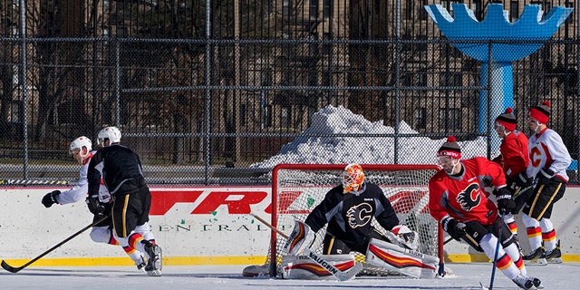 The NHL's Calgary Flames practice at Lasker Rink in New York's Central Park.