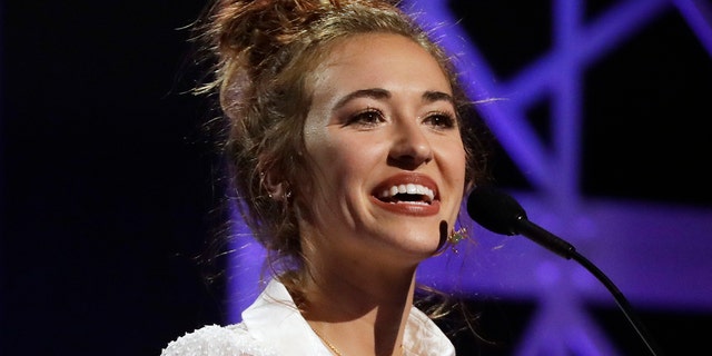 Lauren Daigle accepts the artist of the year award during the Dove Awards on Tuesday, Oct. 15, 2019, in Nashville, Tenn.