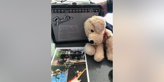 Employees at the Hard Rock Hotel at Universal Studios Orlando photographed Special Dog enjoying his extra vacation time, and send the pics along to Millie.