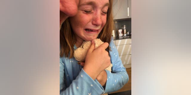 Millie's mom took photos of her daughter's emotional reunion with