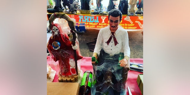 A figure of folklore legend Jesús Malverde in Mexico City's Tepito.