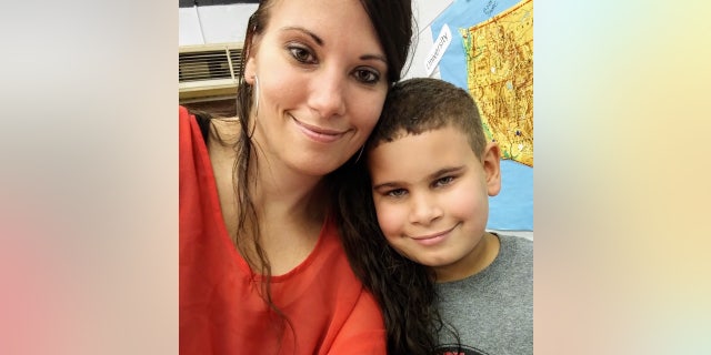 Nicole and her eight-year-old son, Elijah. Nicole was well-known in the community for her spirited personality and strength.