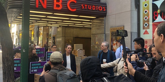 Protesters rallied outside NBC News headquarters in New York City on Tuesday.