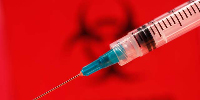 A Pakistani doctor is accused of reusing syringes on patients, leading to an outbreak of nearly 900 children and 200 adults.