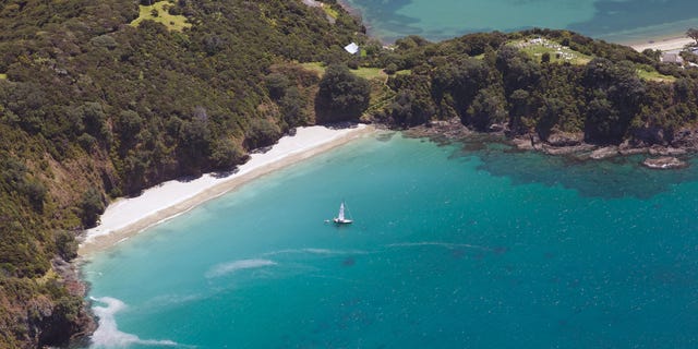 An aerial view of the Bay of Islands, North Island, New Zealand. The Bay of Islands boasts a unique coastline sheltering over 150 small islands in its arms.